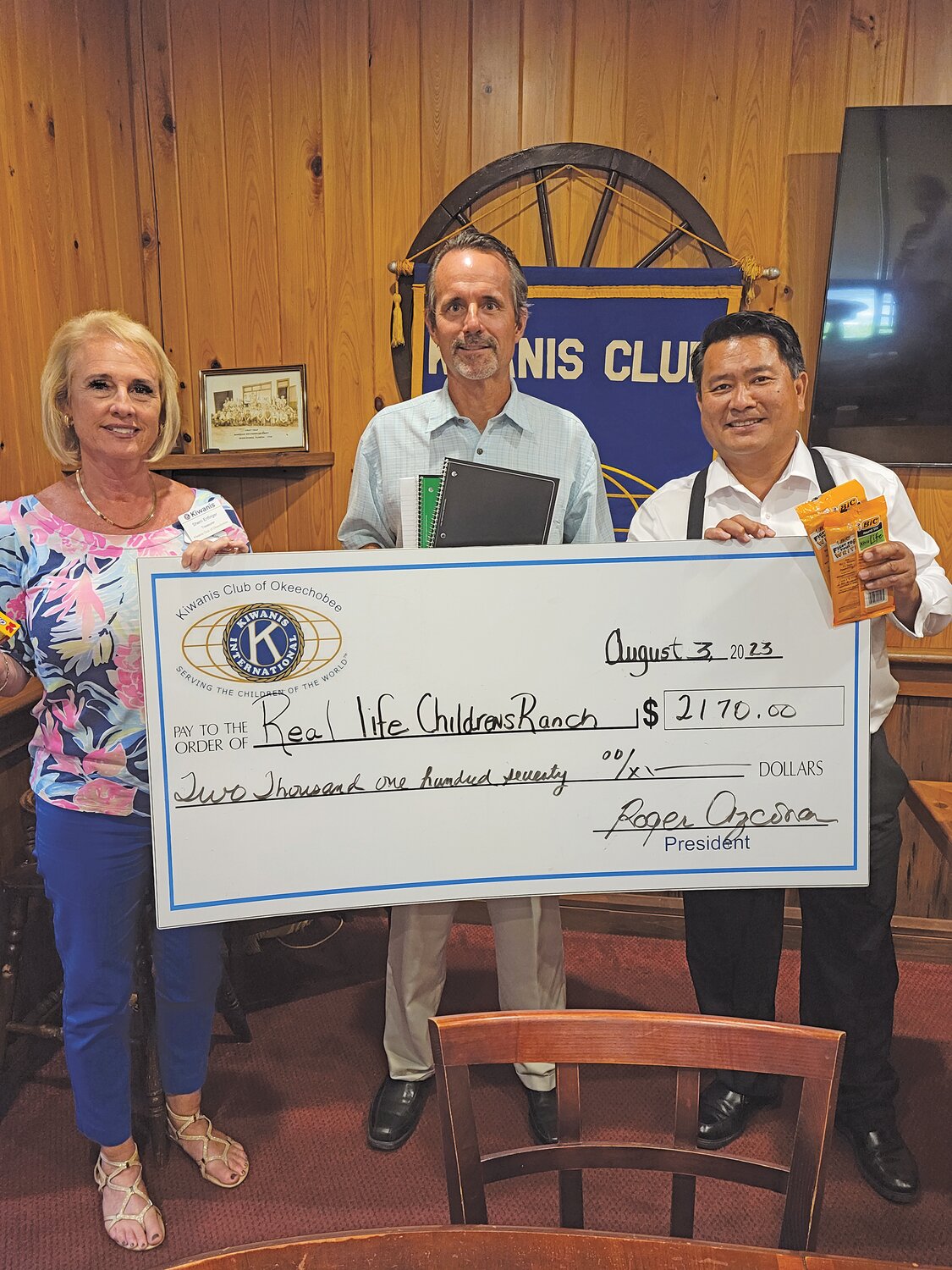 Pictured from left to right are Kiwanis member Sherri Enfinger, RLCR Executive Director Mark Mayers and Kiwanis President Roger Azcona.
